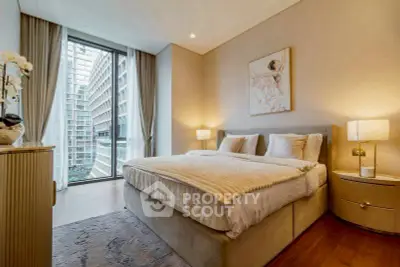 Luxurious bedroom with modern decor and stunning city view through large window.