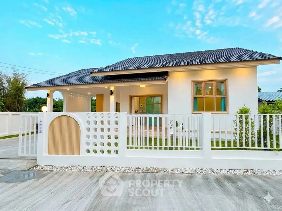 Charming single-story home with modern design and spacious front yard