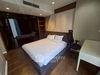 Modern bedroom with sleek design and comfortable furnishings