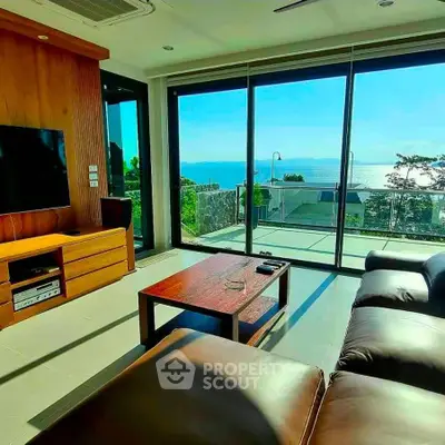 Luxurious living room with stunning ocean view and modern furnishings