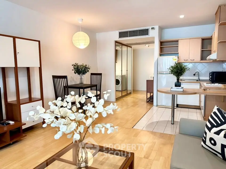 Spacious modern living room with open kitchen and stylish decor