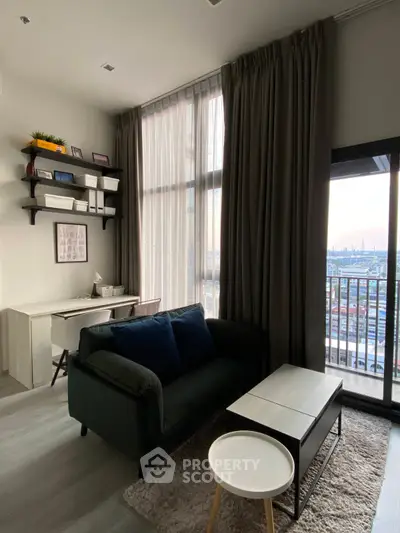 Modern living room with city view, stylish furniture, and floor-to-ceiling windows.