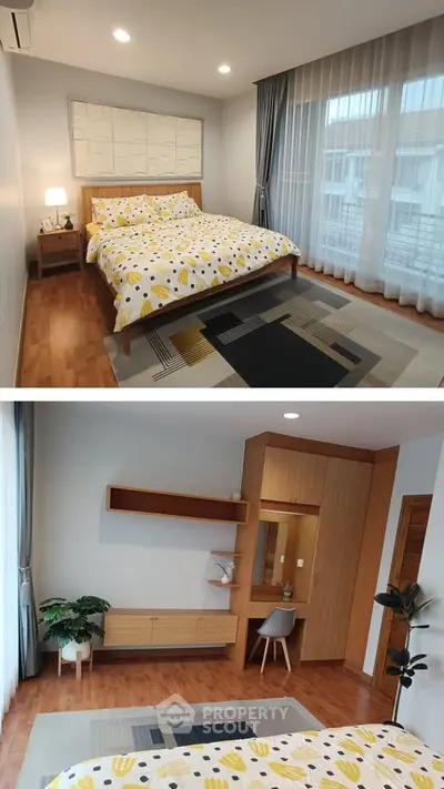 Modern bedroom with stylish decor and large window for natural light.