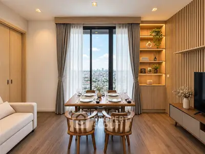 Elegant dining area with city view, featuring wooden furniture and modern decor in a stylish apartment.