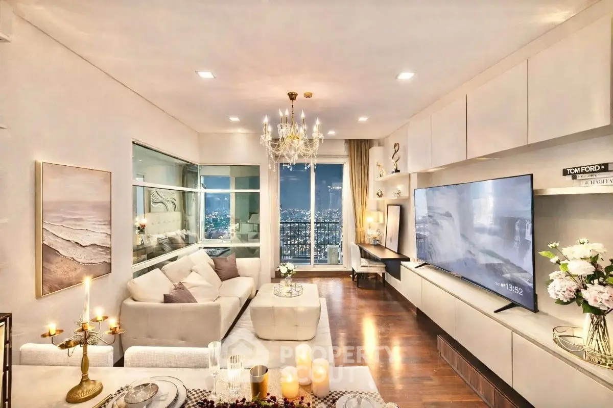 Luxurious living room with stunning city view, elegant decor, and modern furnishings.