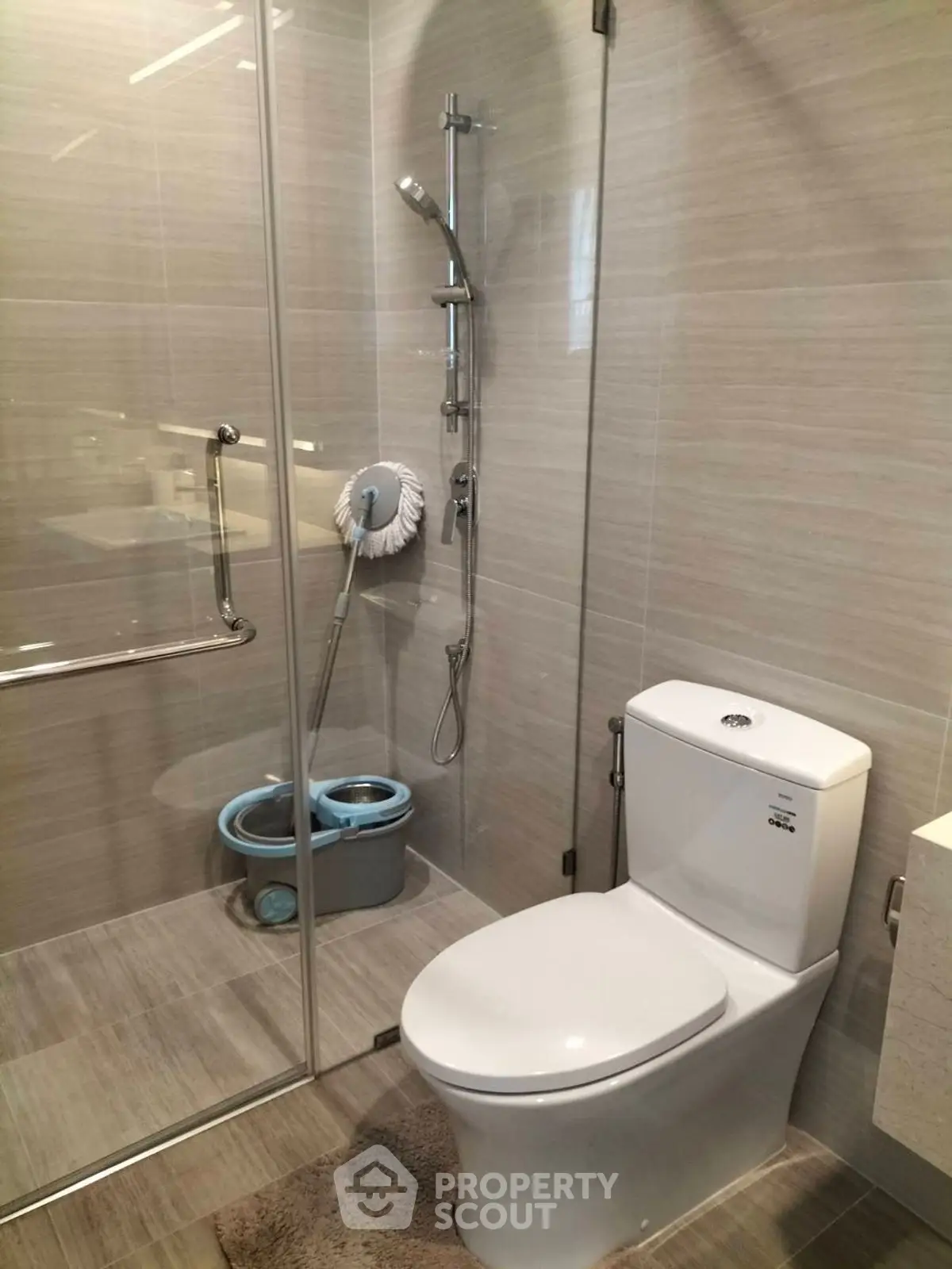 Modern bathroom with glass shower and sleek fixtures