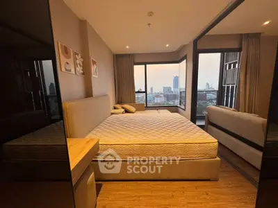 Luxurious bedroom with panoramic city view and modern decor
