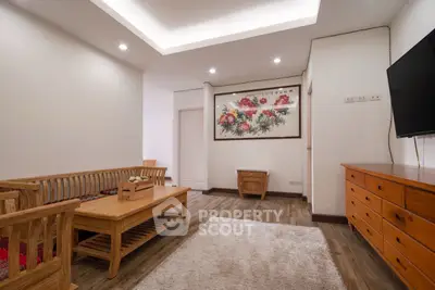 Elegant living room with wooden furniture and modern decor