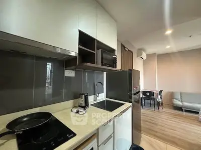 Modern kitchen with sleek design and open layout in a stylish apartment