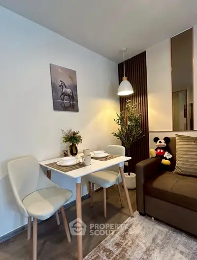 Cozy living room with dining area, modern decor, and plush seating for a comfortable lifestyle.