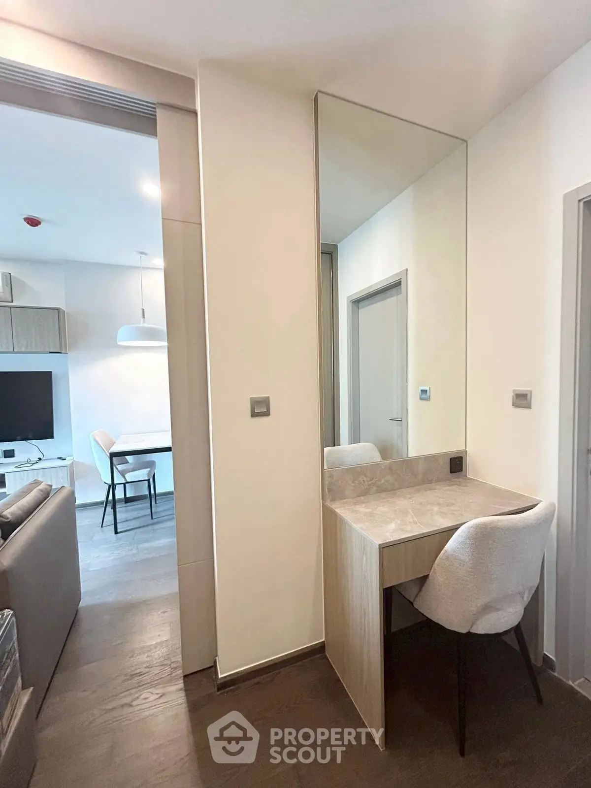 Modern apartment interior with stylish vanity and open living area