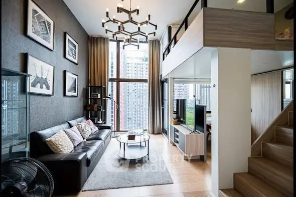 Modern loft-style living room with high ceilings and city view.