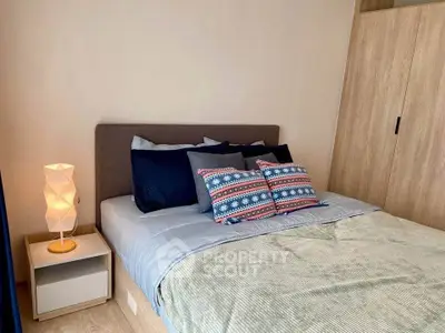 Cozy bedroom with modern decor and stylish bedding