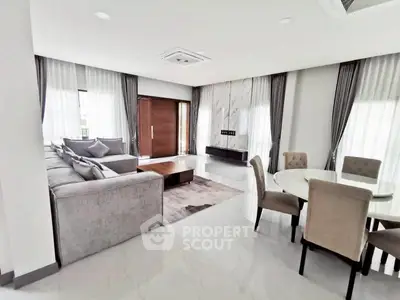 Spacious modern living room with elegant decor and natural light