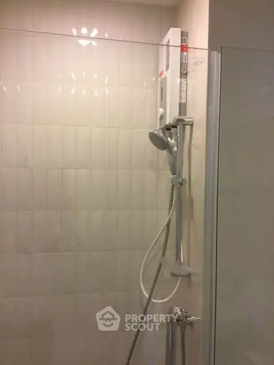 Modern bathroom shower with sleek design and tiled walls