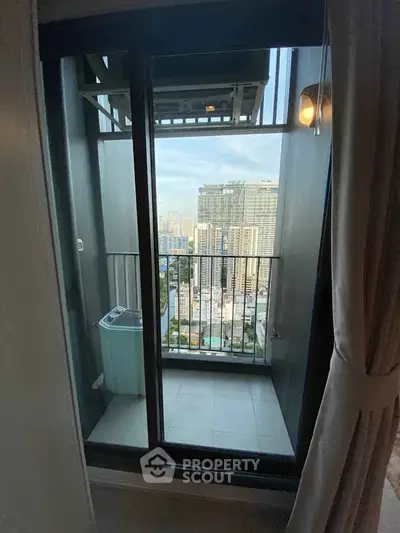 Charming balcony with cityscape view, perfect for urban living enthusiasts.