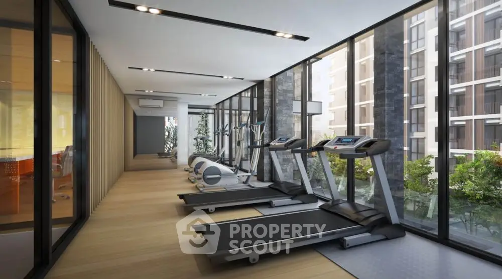 Modern gym with treadmills in luxury apartment building