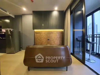 Modern living room with sleek furniture and city view balcony