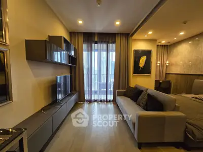 Modern living room with stylish decor and large window view