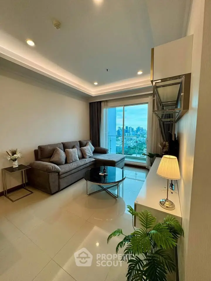 Modern living room with city view, cozy sofa, and elegant decor