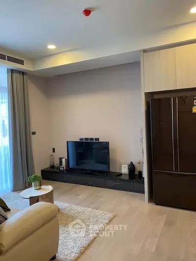 Modern living room with sleek TV setup and stylish decor