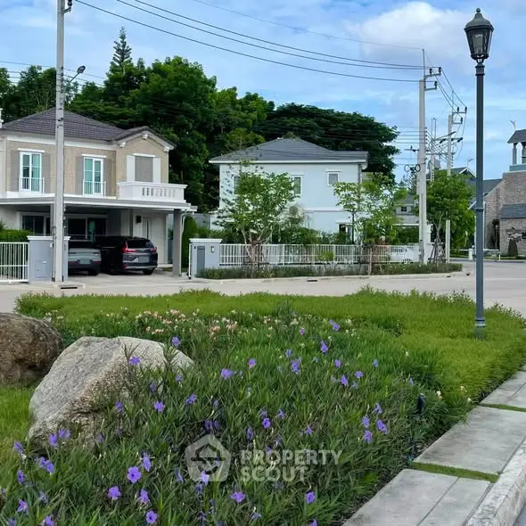 Charming suburban neighborhood with modern homes and lush greenery, perfect for family living.