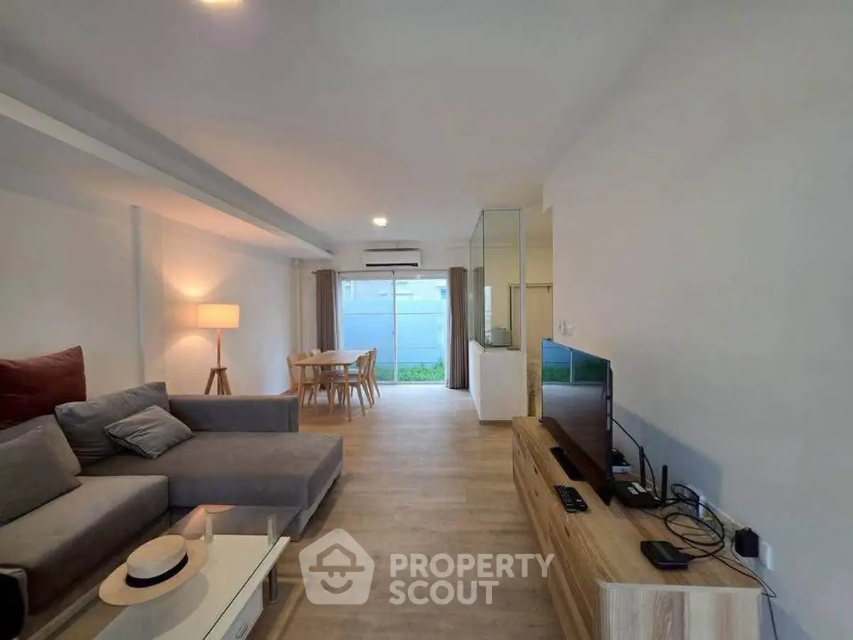 Spacious modern living room with stylish furniture and open layout