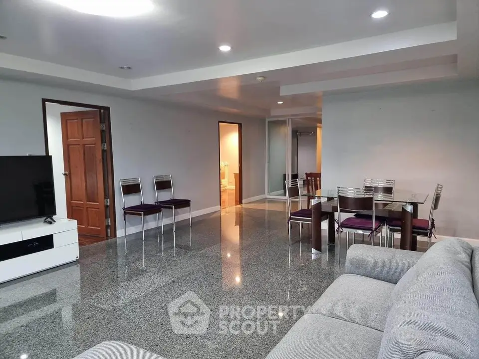 Spacious modern living room with sleek furniture and open layout