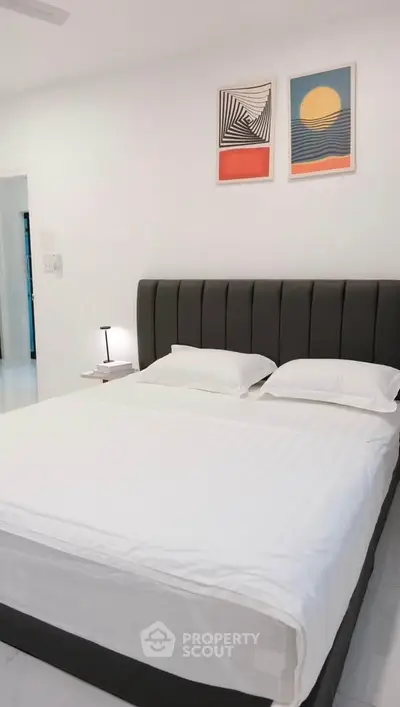 Modern bedroom with stylish decor and cozy ambiance