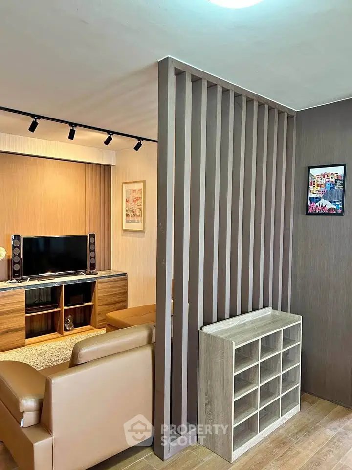 Modern living room with stylish partition and cozy seating area