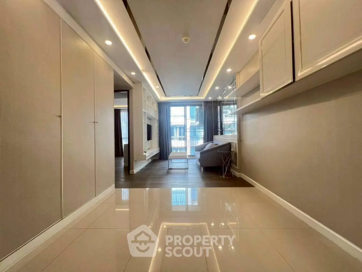 Spacious modern living room with sleek design and ample natural light