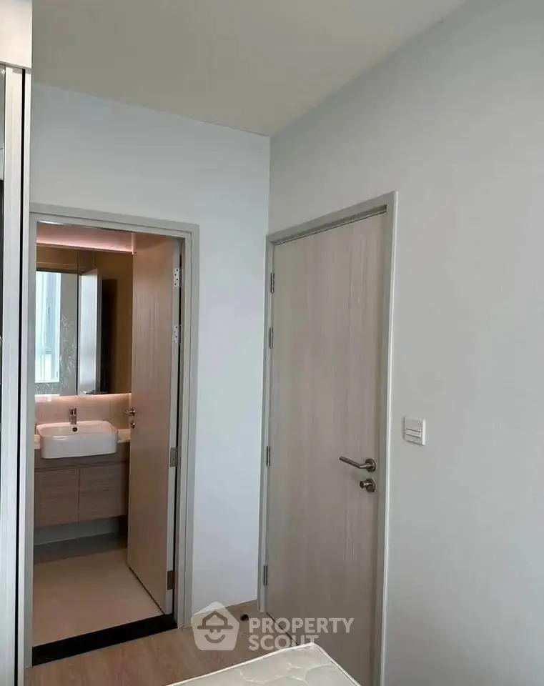 Modern minimalist bathroom with sleek fixtures and neutral tones