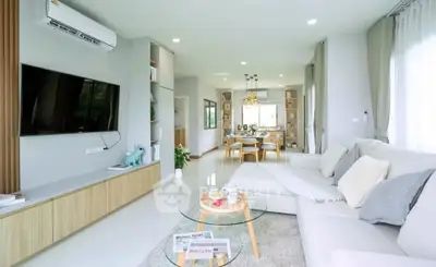 Spacious modern living room with elegant decor and natural light