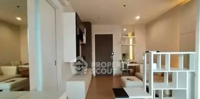 Modern living room with stylish furniture and open layout in a contemporary apartment.