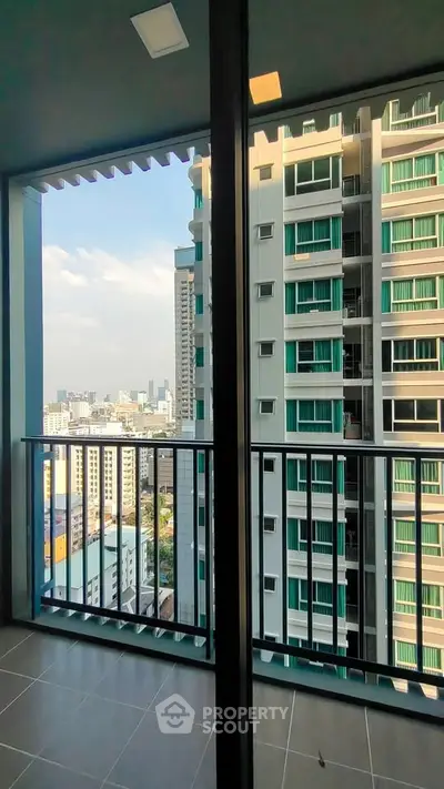 Modern high-rise apartment balcony with stunning city view