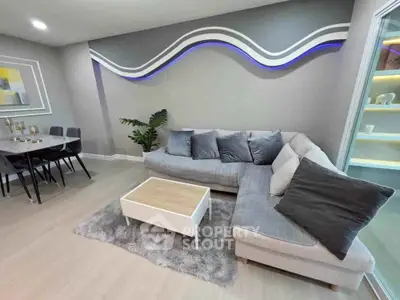 Modern living room with stylish decor and cozy seating area