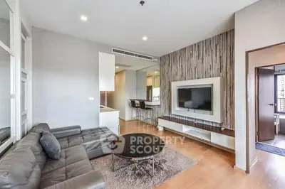 Modern living room with sleek design and open layout in a stylish apartment.