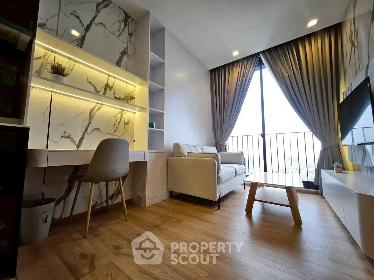 Modern living room with stylish decor and balcony view