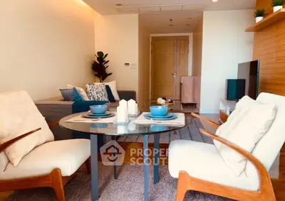 Stylish living room with modern furniture and cozy ambiance in a contemporary apartment.
