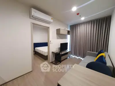Modern apartment living room with air conditioning and stylish decor