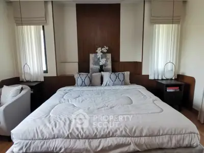 Luxurious bedroom with elegant decor and plush bedding, perfect for relaxation and comfort.