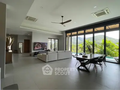 Spacious living room with stunning mountain view and modern decor