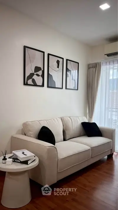 Modern living room with stylish decor and cozy sofa