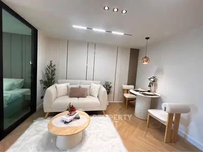 Modern living room with cozy seating and elegant decor