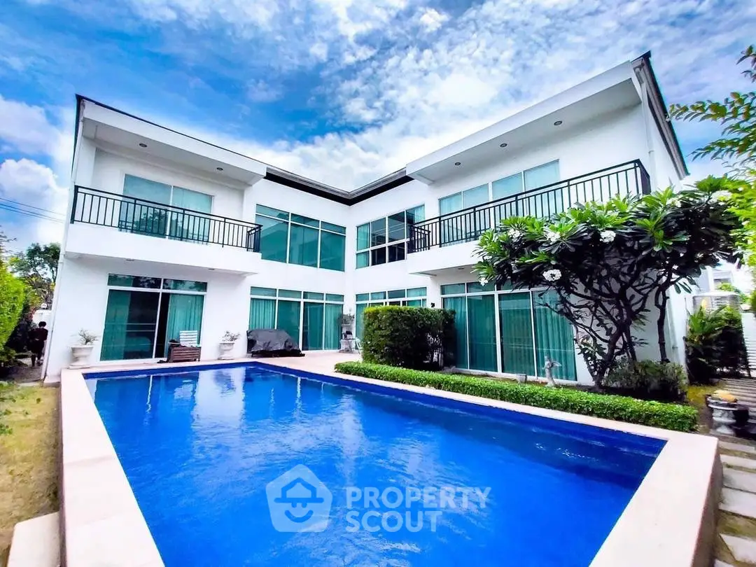 Stunning modern villa with private pool and lush garden, perfect for luxury living.