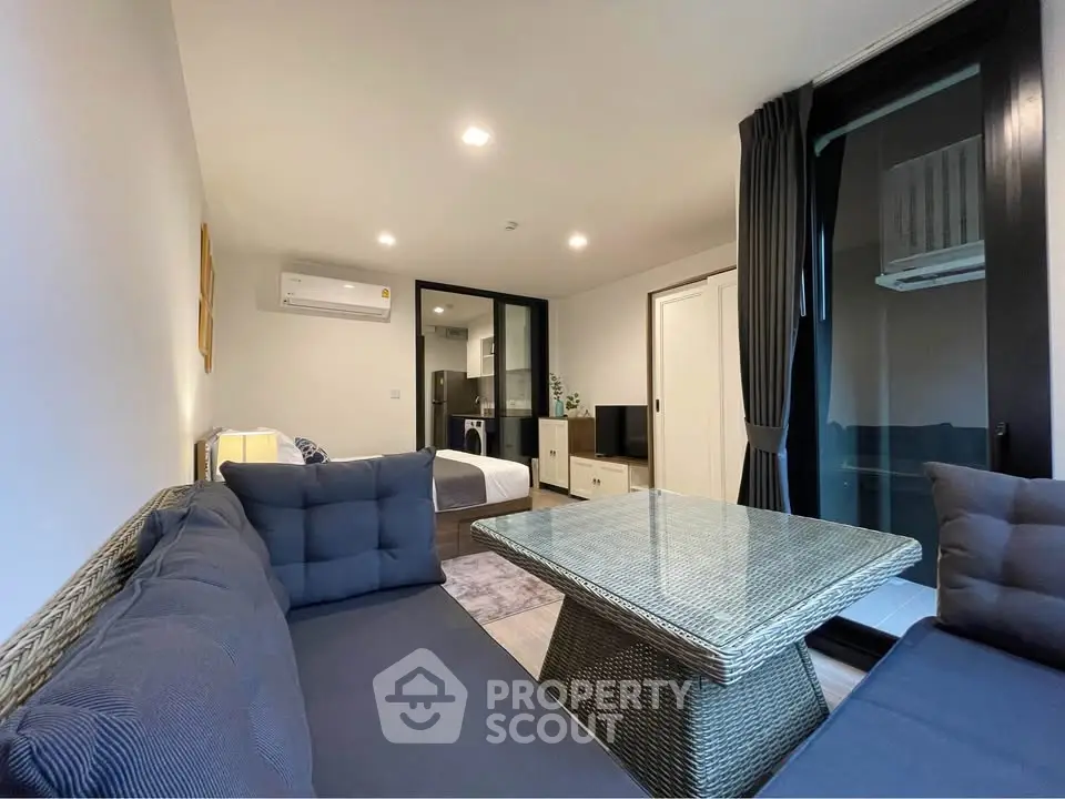 Modern living room with stylish furniture and cozy ambiance in a contemporary apartment.