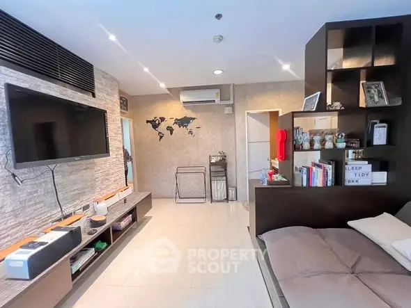 Modern living room with wall-mounted TV and stylish decor