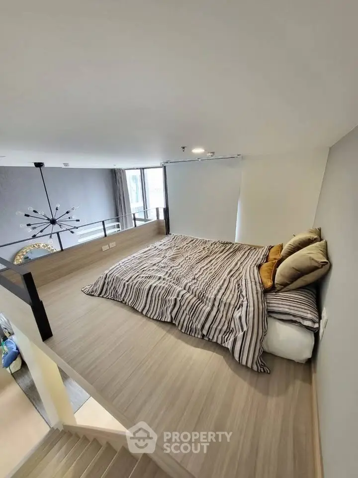 Modern loft bedroom with stylish decor and cozy ambiance