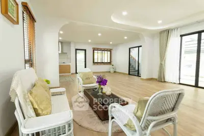 Spacious living room with elegant decor and natural light