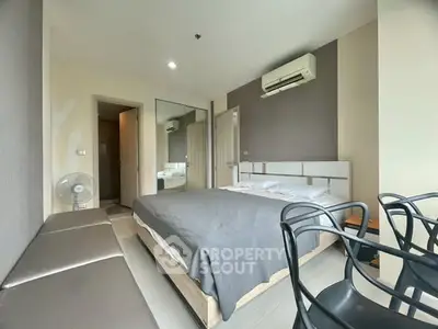 Modern bedroom with air conditioning and stylish decor